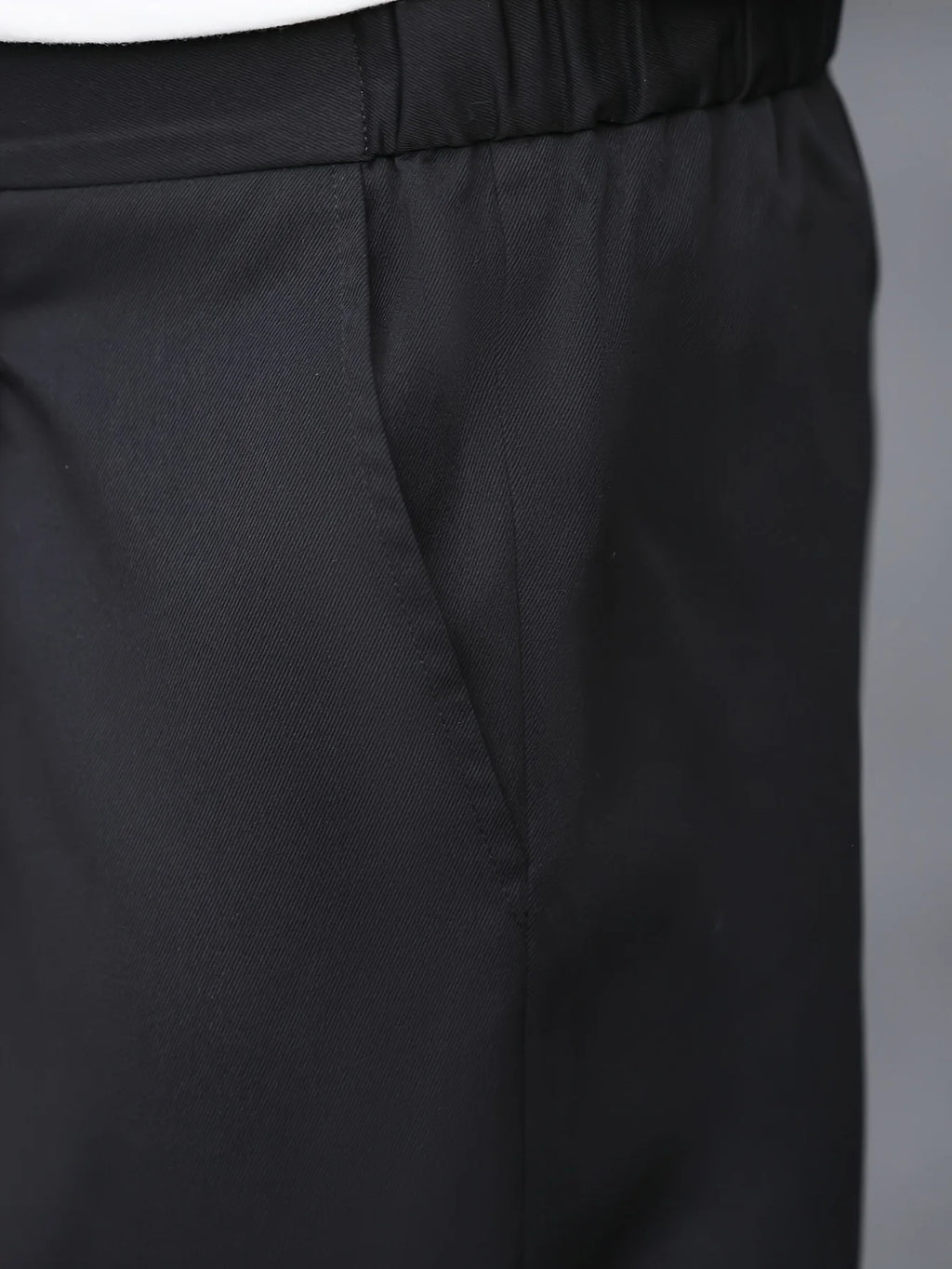 Men's white pleated trousers for layering through autumn and winter