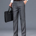 Men's grey tailored trousers for layering through autumn and winter