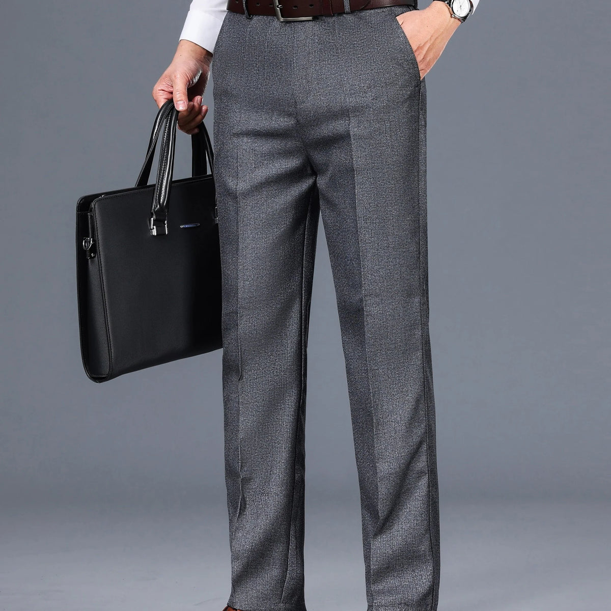 Men's grey tailored trousers for layering through autumn and winter