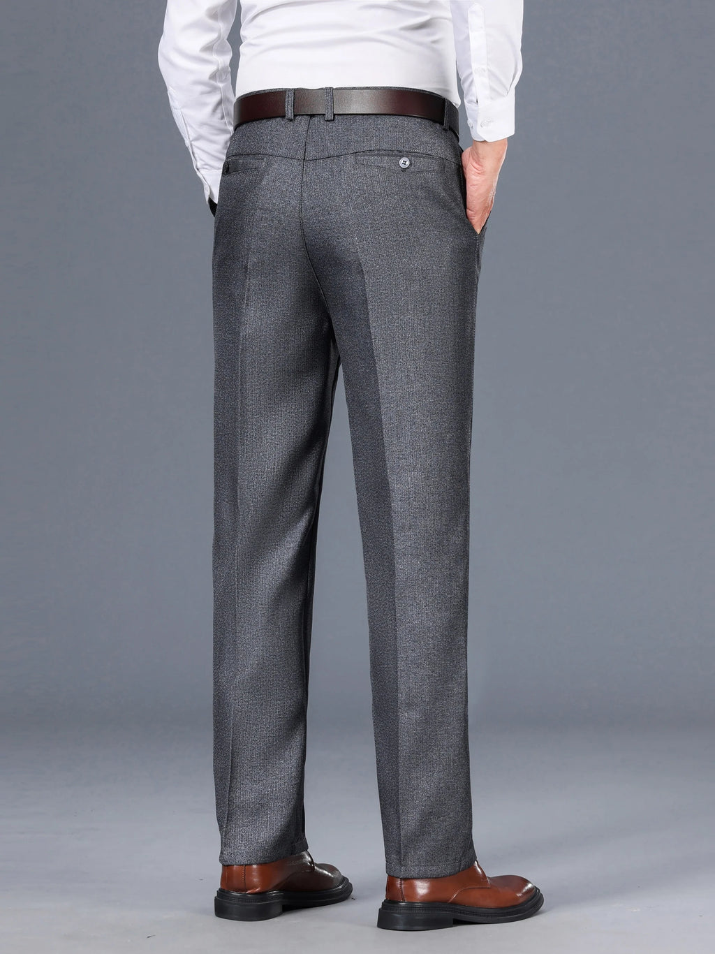 Men's grey tailored trousers for layering through autumn and winter