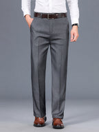 Men's grey tailored trousers for layering through autumn and winter