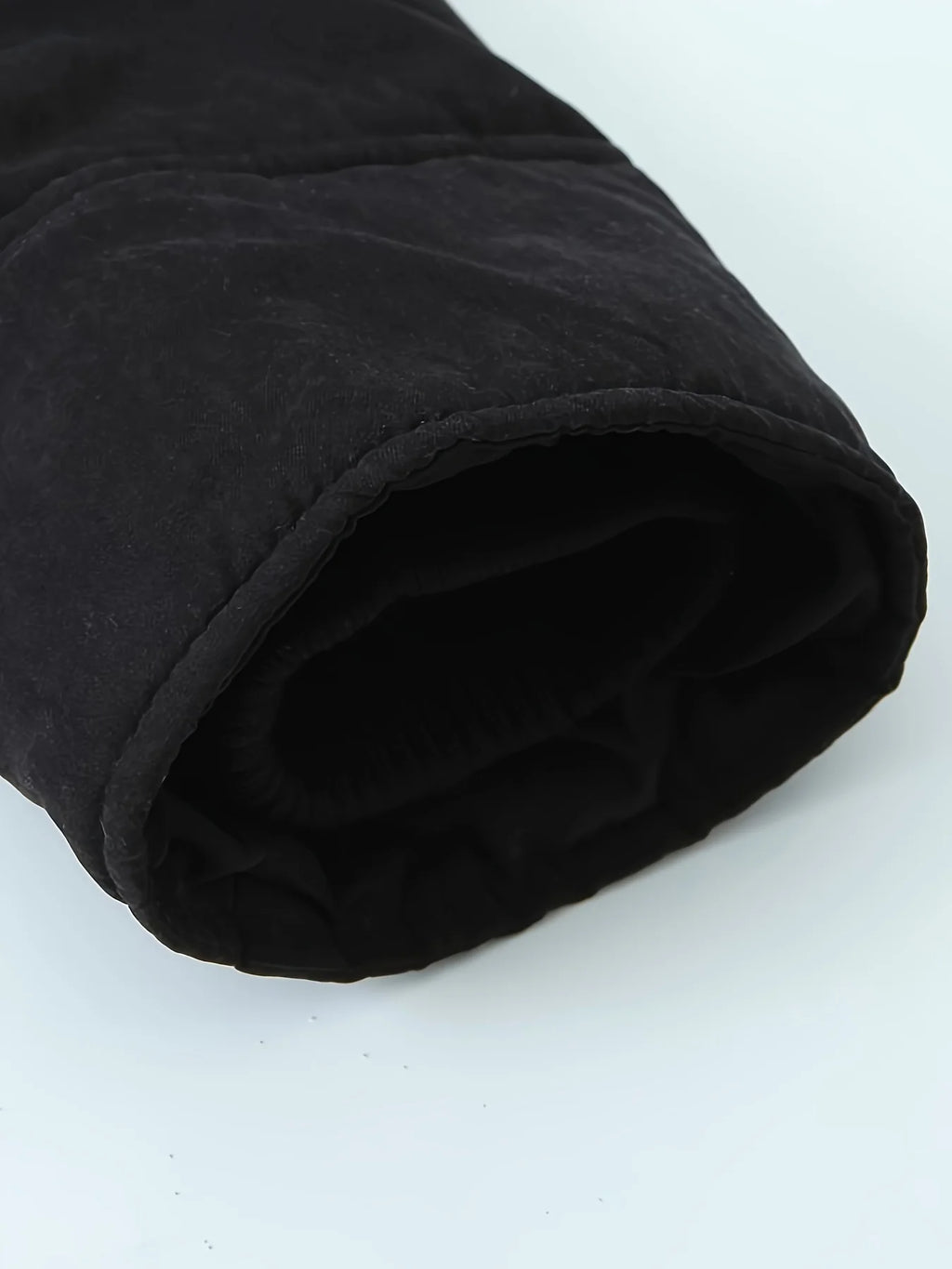 Men's black cosy longline winter parka for everyday cold-weather wear