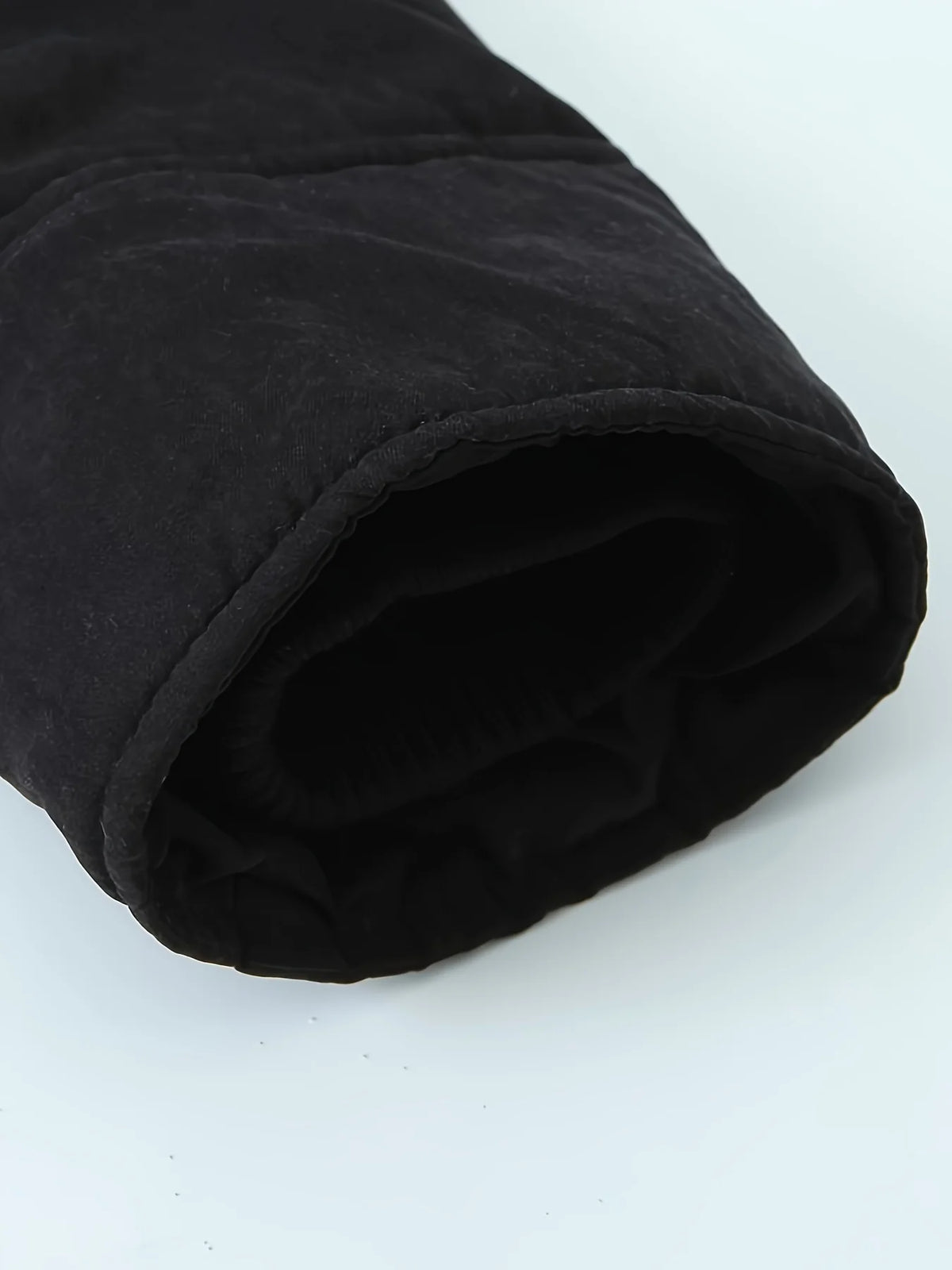 Men's black cosy longline winter parka for everyday cold-weather wear