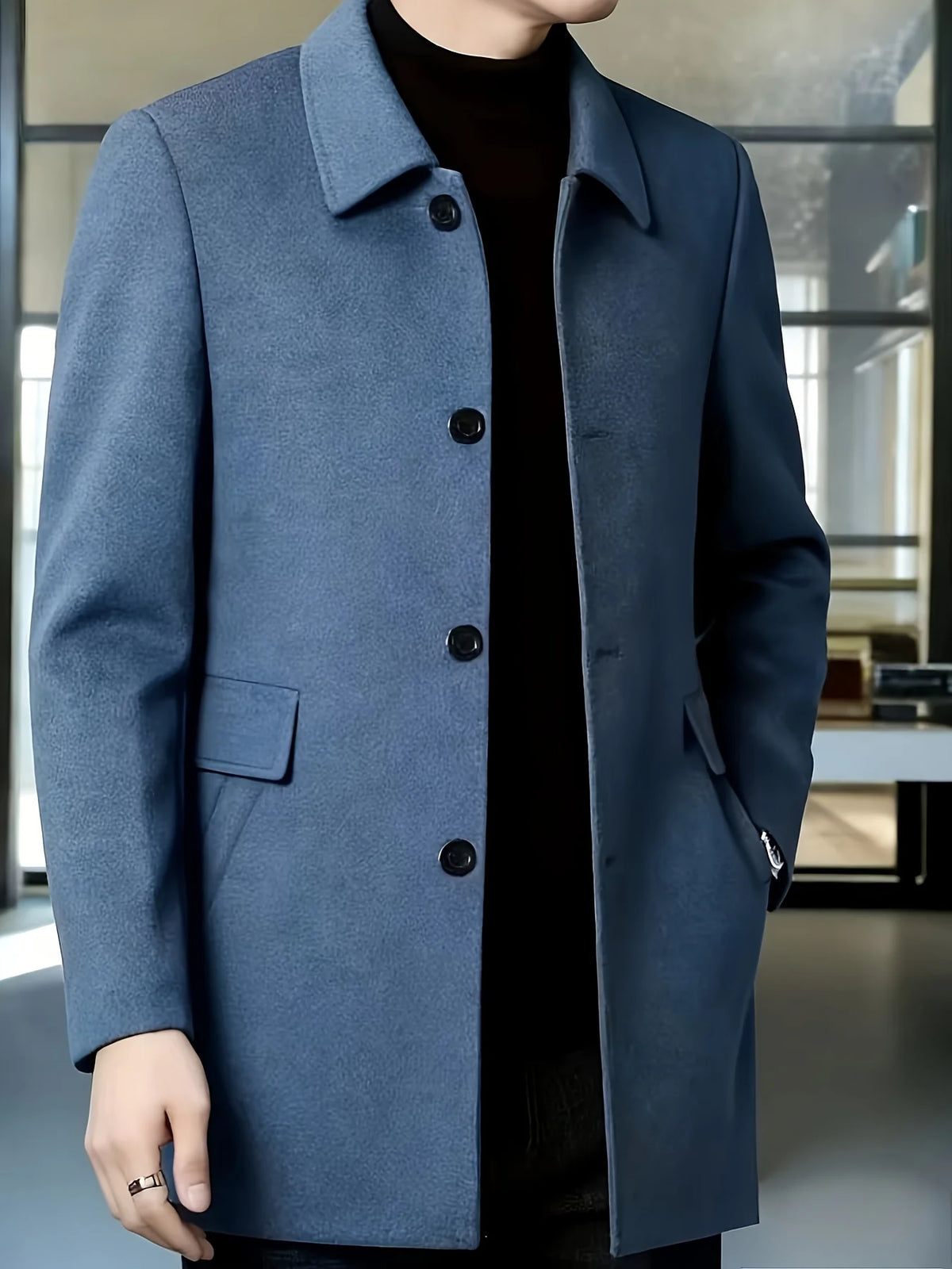 Men's black tailored single-breasted overcoat for cold weather wear
