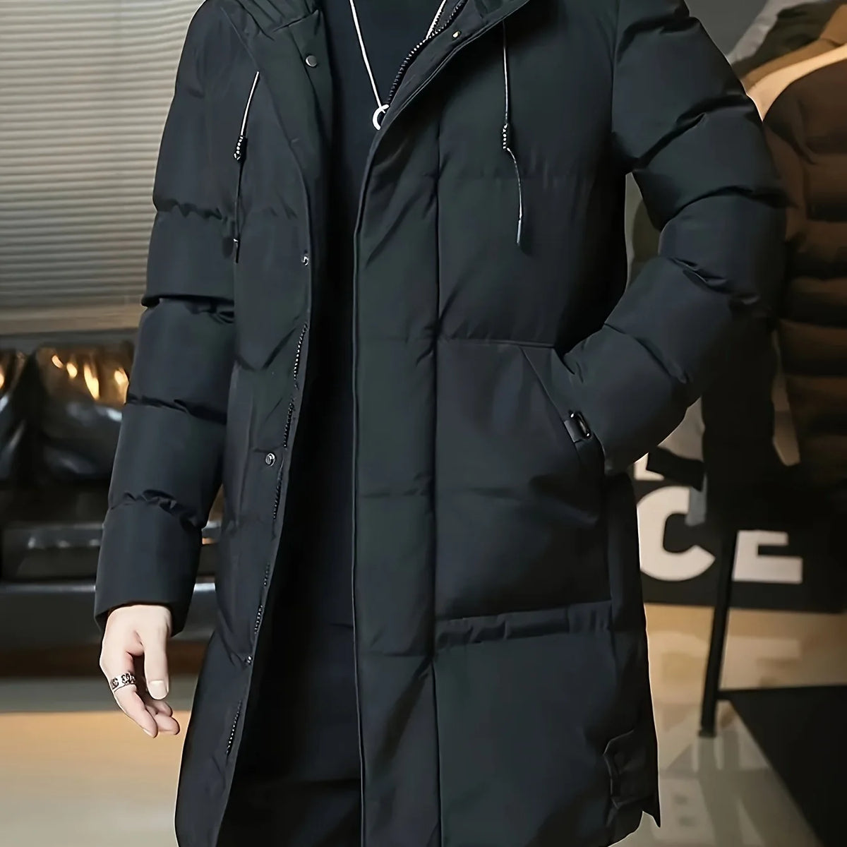 Men's black hooded longline winter coat for cold autumn and winter days