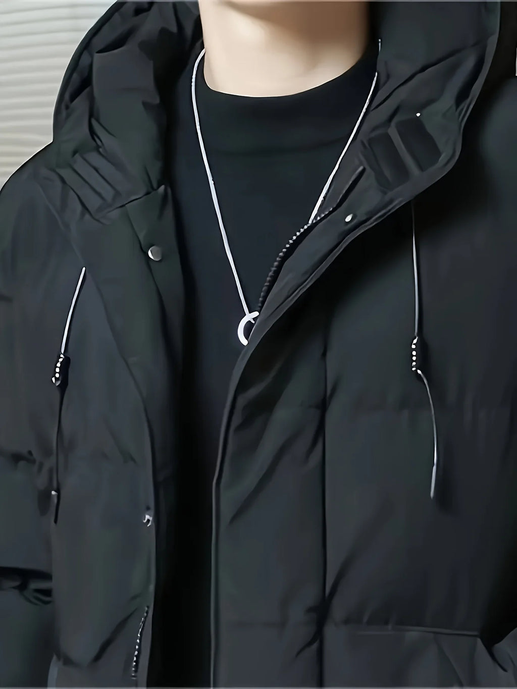 Men's black hooded longline winter coat for cold autumn and winter days
