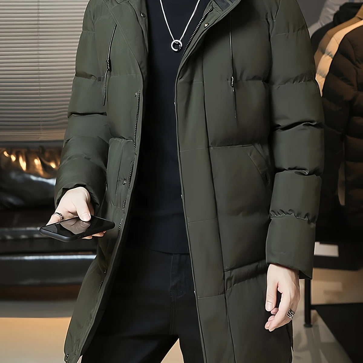 Men's green hooded longline winter coat for cold autumn and winter days