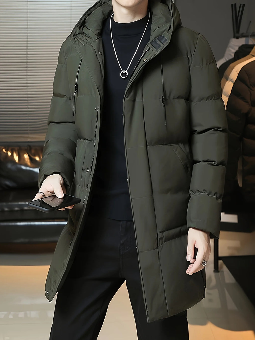Men's green hooded longline winter coat for cold autumn and winter days