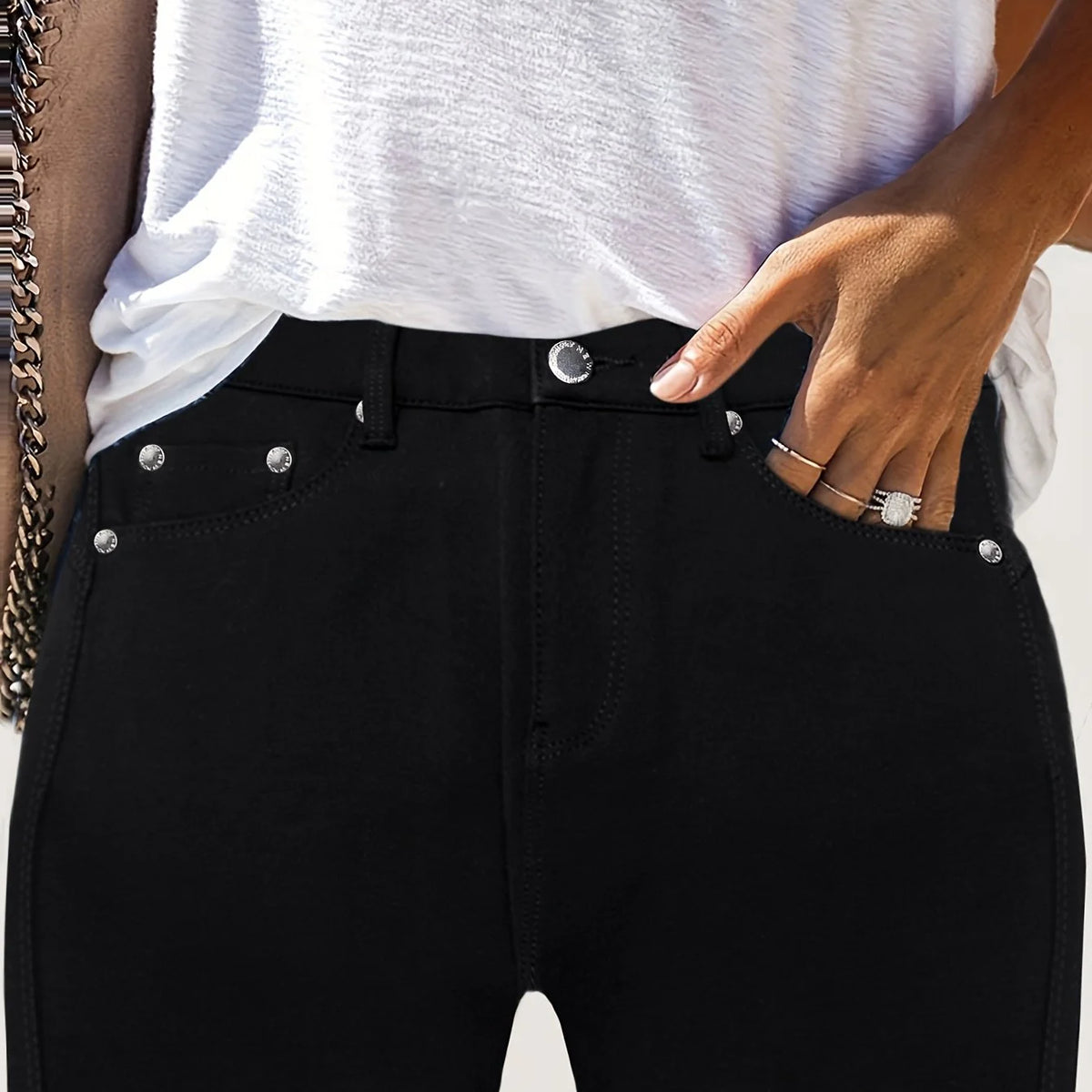 Women's black high-rise skinny jeans for cold autumn and winter days