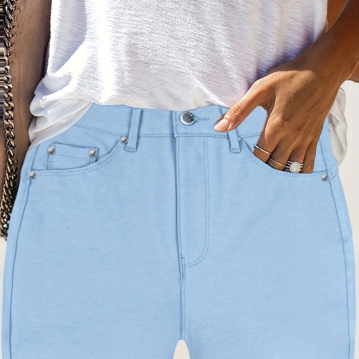 Women's light blue high-rise skinny jeans for cold autumn and winter days