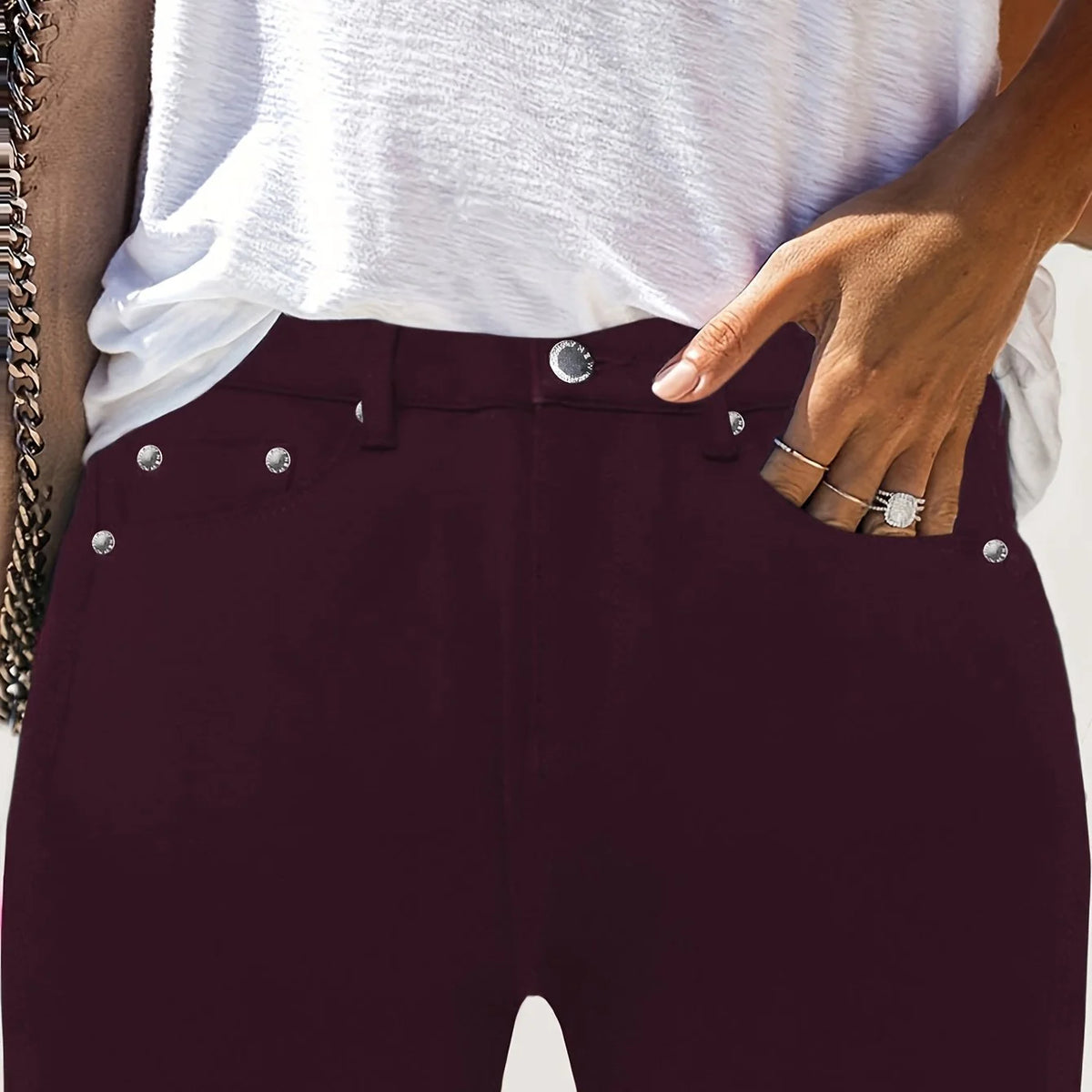 Women's deep red high-rise skinny jeans for cold autumn and winter days