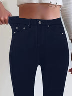 Women's deep blue high-rise skinny jeans for cold autumn and winter days