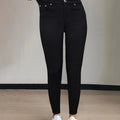 Women's black high-waisted skinny jeans