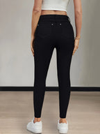 Women's red high-waisted skinny jeans