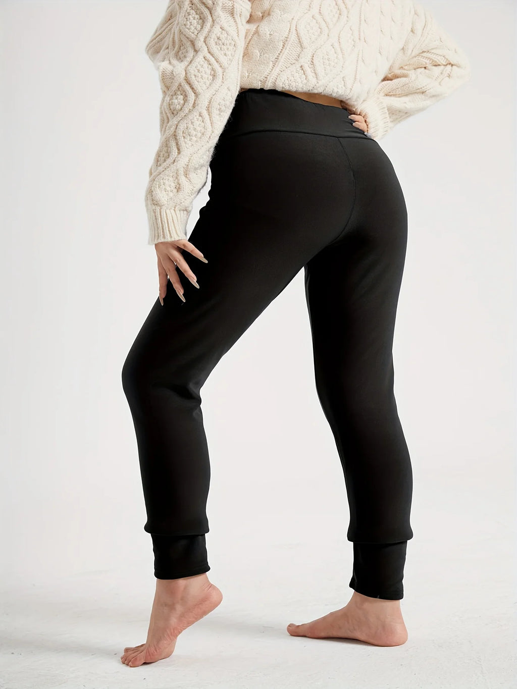 Women's black high-waist fleece-lined leggings in autumn and winter