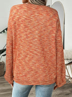 Women's orange-red relaxed waffle knit sweater for everyday winter wear