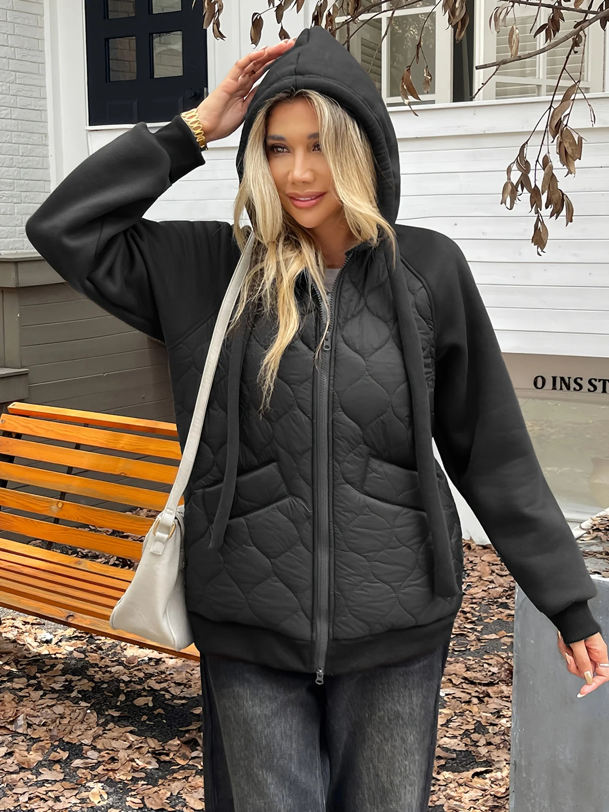 Women's black quilted hooded jacket