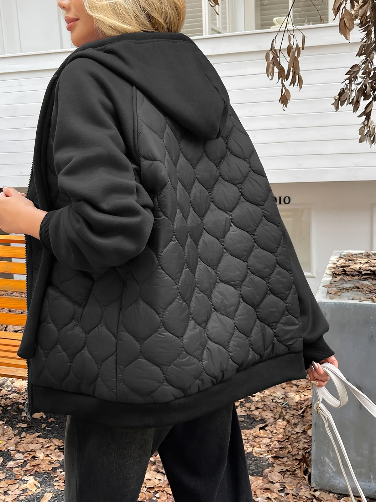 Women's black quilted hooded jacket
