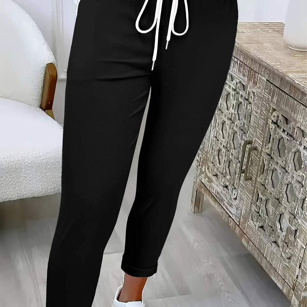 Women's black relaxed drawstring trousers for autumn and winter wear