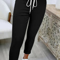 Women's black relaxed drawstring trousers for autumn and winter wear
