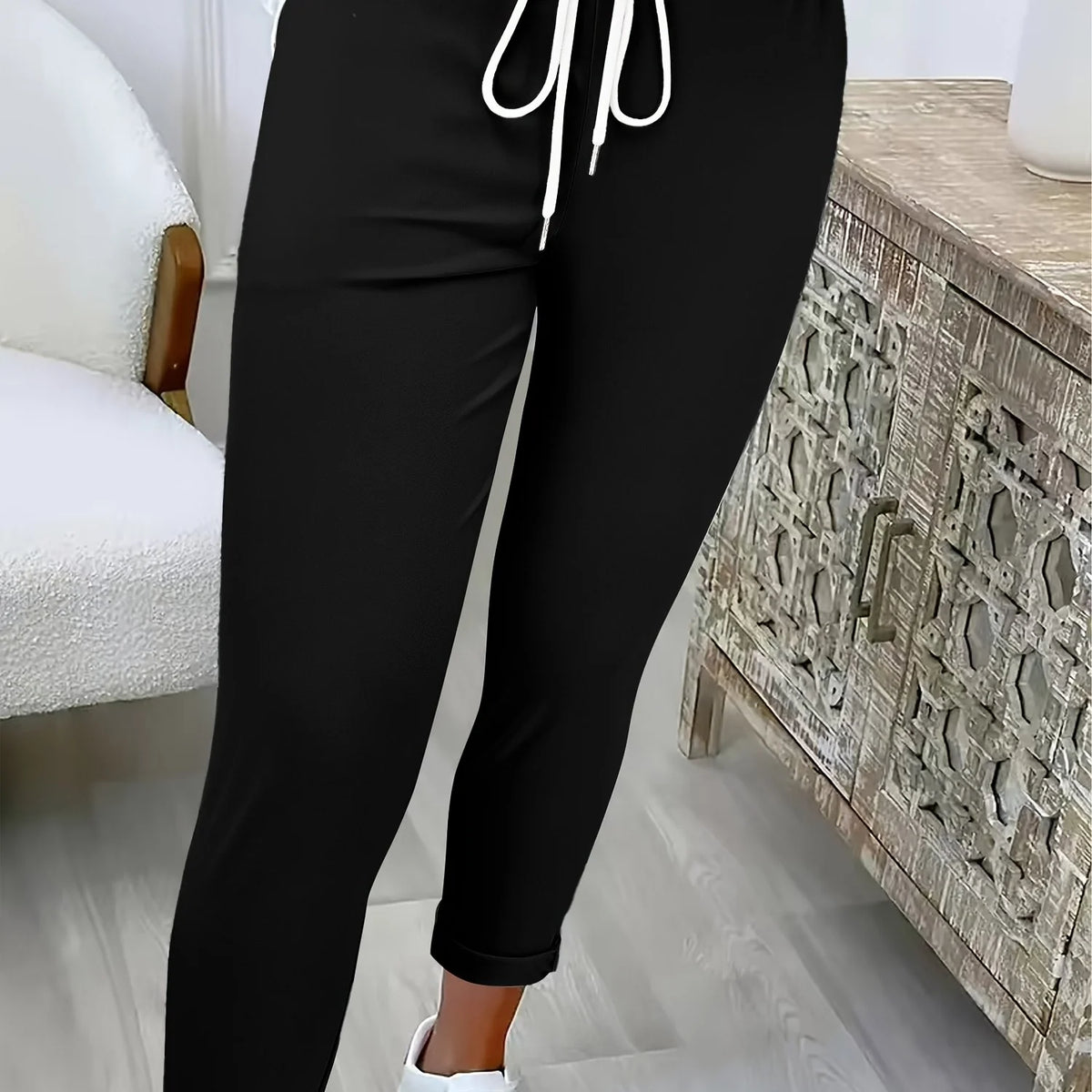 Women's black relaxed drawstring trousers for autumn and winter wear