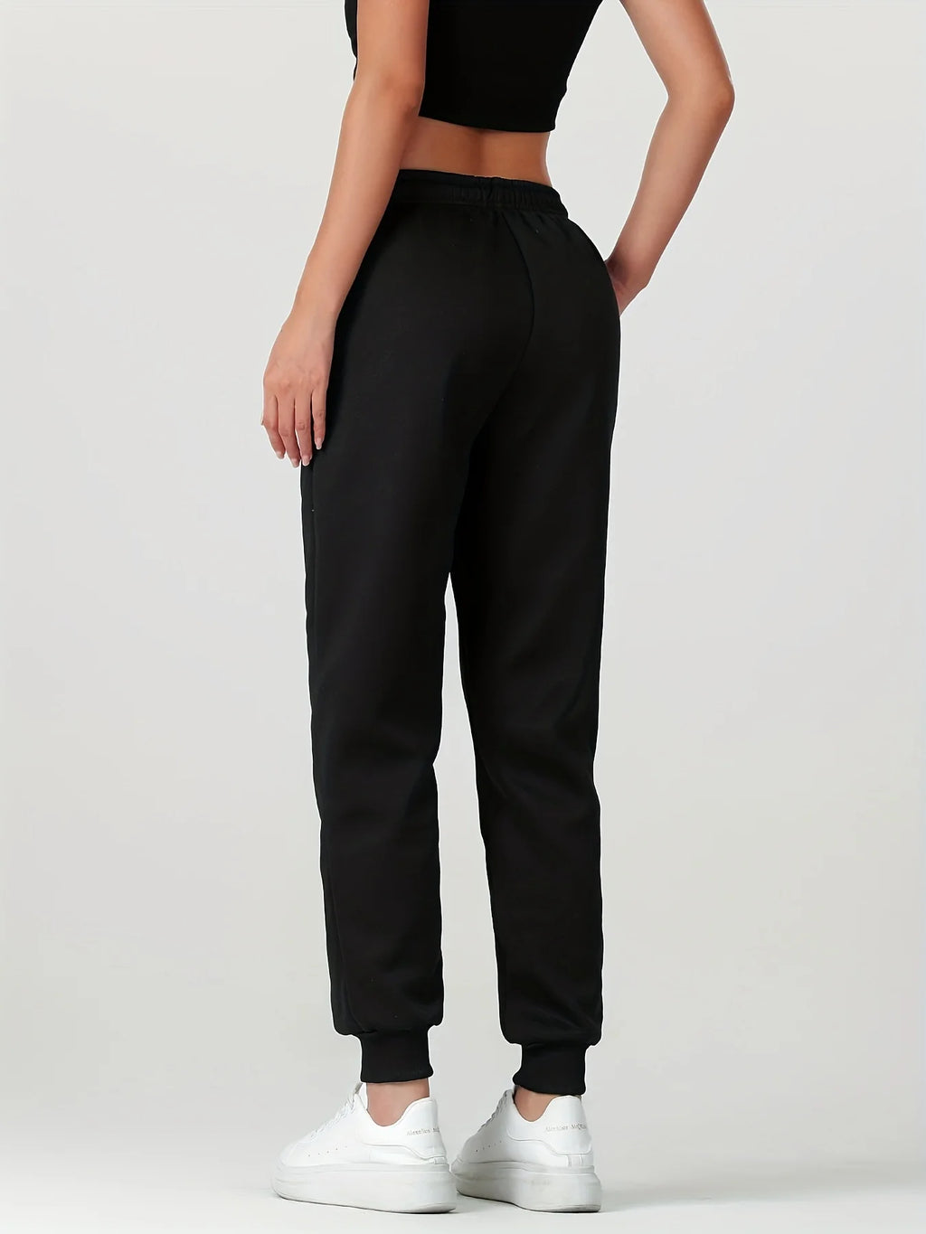 Women's black cosy cuffed joggers for the autumn and winter season