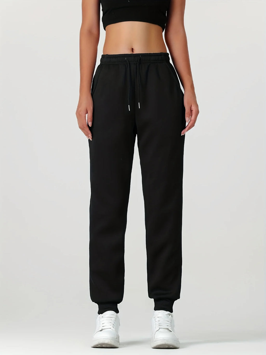 Women's black cosy cuffed joggers for the autumn and winter season