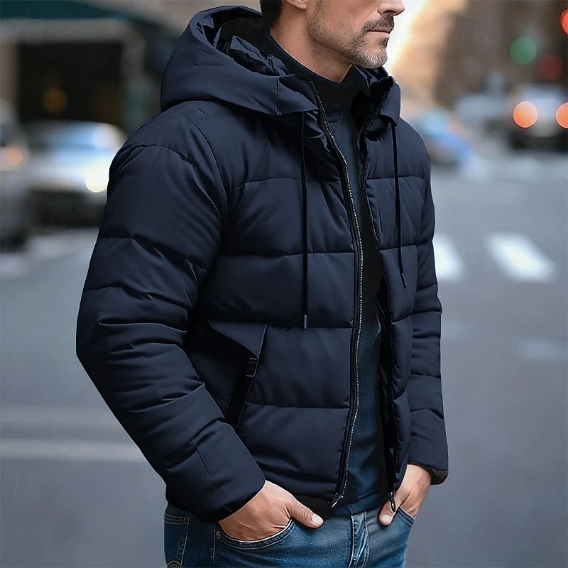 Men's blue hooded quilted puffer jacket for cold weather wear