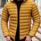 Men's yellow lightweight quilted jacket for cold autumn and winter days