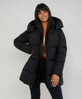 Women's black longline puffer jacket with hood for cold weather wear