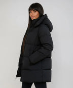Women's black longline puffer jacket with hood for cold weather wear