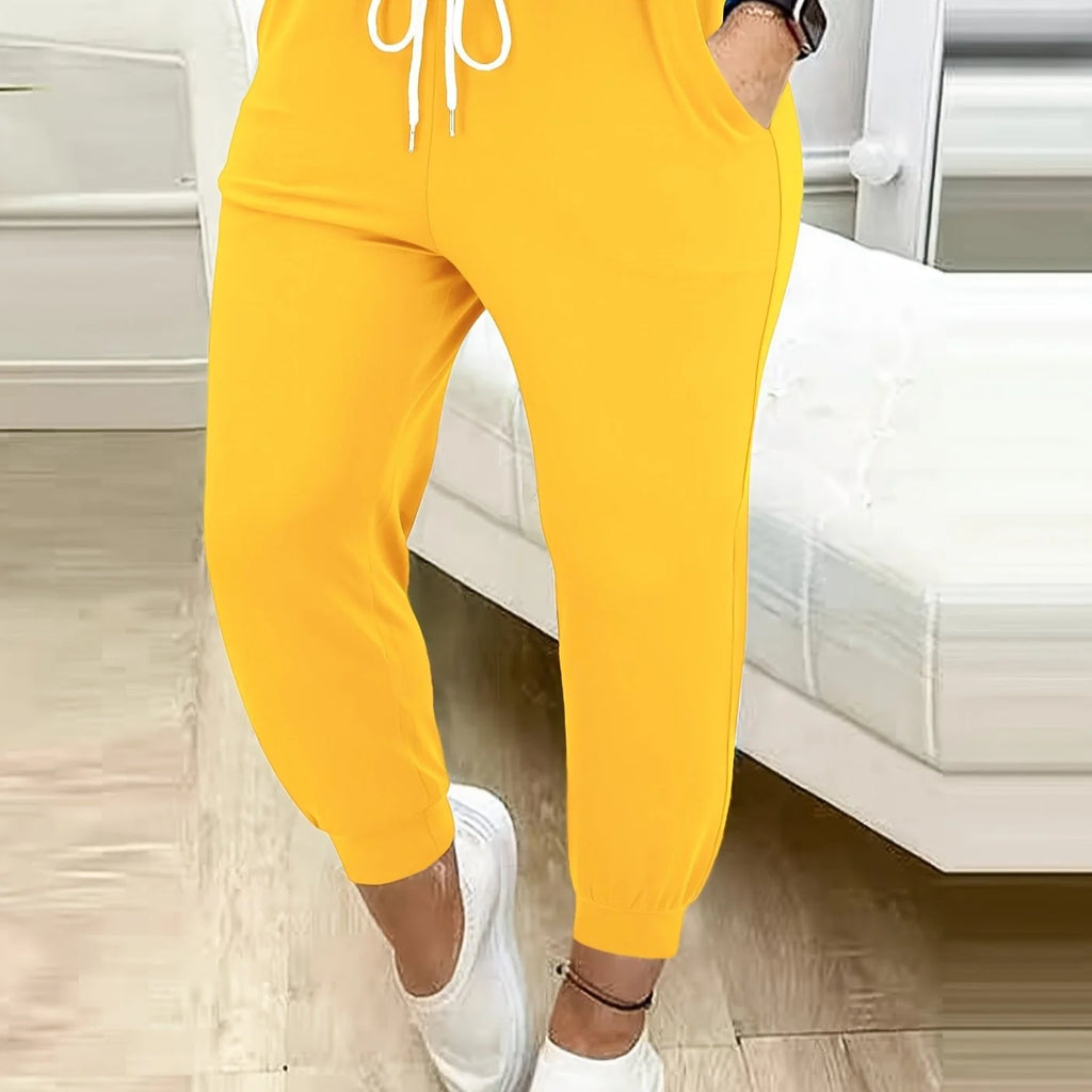 Women's yellow relaxed tapered joggers for chilly autumn and winter days