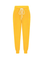Women's yellow relaxed tapered joggers for chilly autumn and winter days