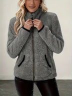 Women's white cosy zip-up jacket for autumn and winter layering