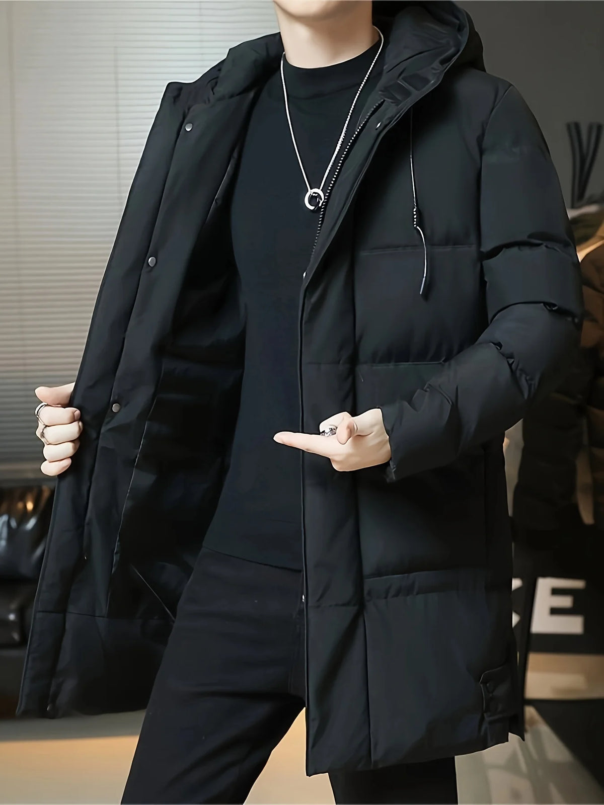 Men's black hooded longline padded coat for autumn and winter layering