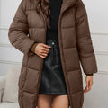 Women's reddish brown longline puffer coat with hood for autumn and winter wear