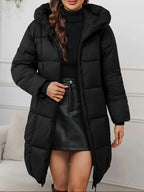 Women's black longline puffer coat with hood for autumn and winter wear