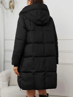Women's black longline puffer coat with hood for autumn and winter wear