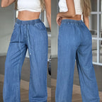 Women's light blue relaxed wide-leg trousers in a soft everyday shade