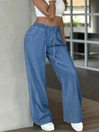 Women's light blue relaxed wide-leg trousers in a soft everyday shade
