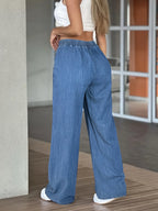 Women's light blue relaxed wide-leg trousers in a soft everyday shade