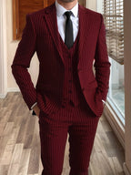 Men's burgundy tailored pinstripe three-piece suit in autumn and winter