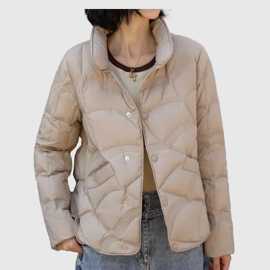 Women's beige quilted jacket with stand collar and button front