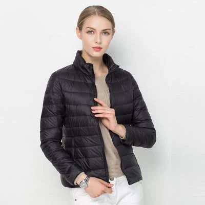 Women's black quilted puffer jacket with stand collar for winter wear