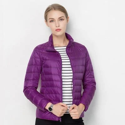 Women's purple quilted puffer jacket with stand collar for winter wear