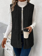 Women's black sleeveless textured gilet for autumn and winter layering