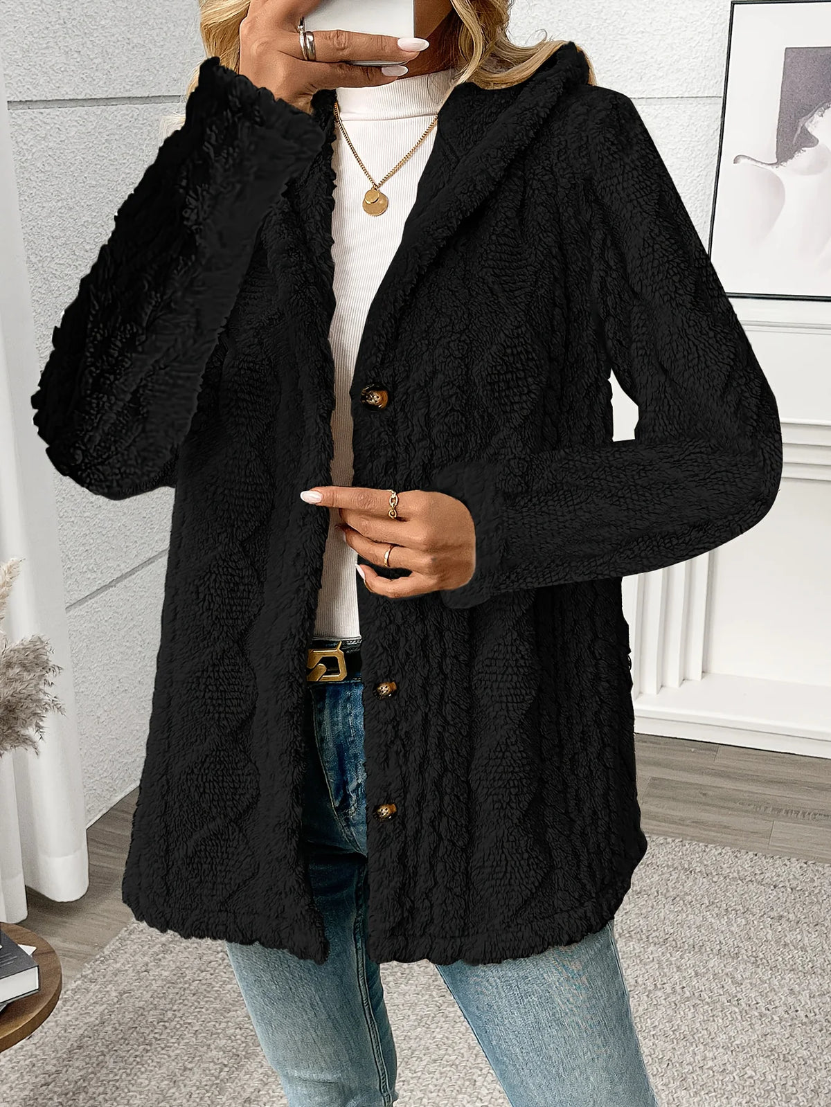 Women's black textured hooded jacket for chilly autumn and winter days