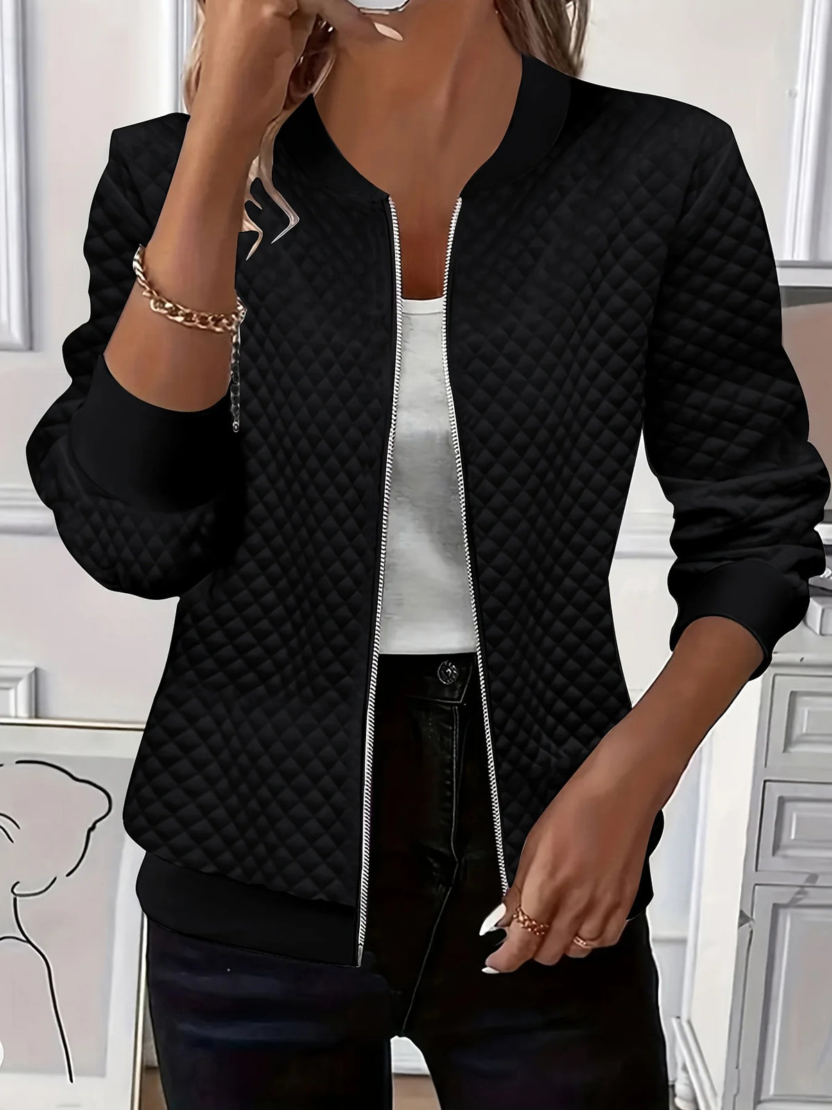 Women's black textured quilted jacket for chilly autumn and winter days