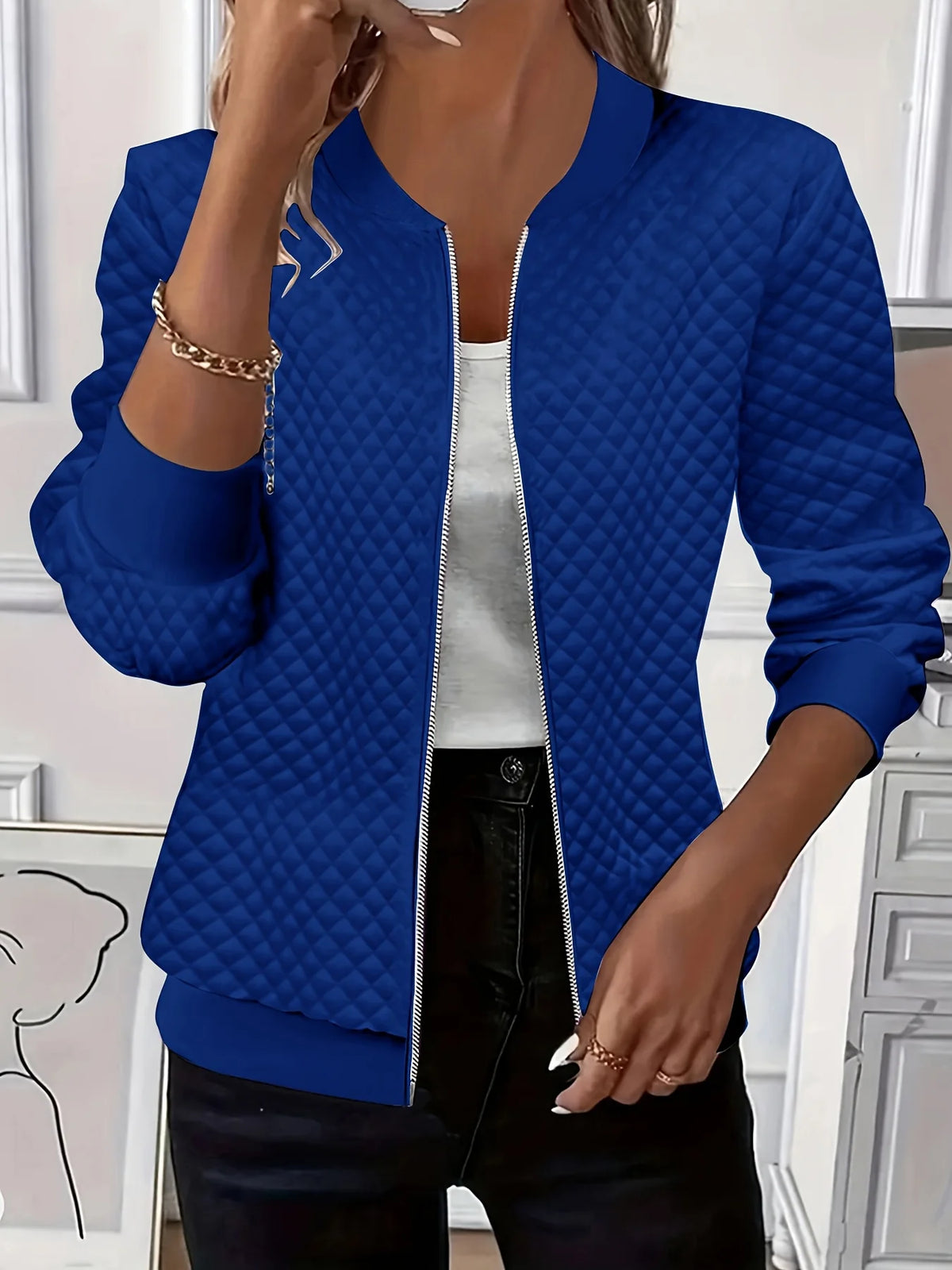 Women's black textured quilted jacket for chilly autumn and winter days