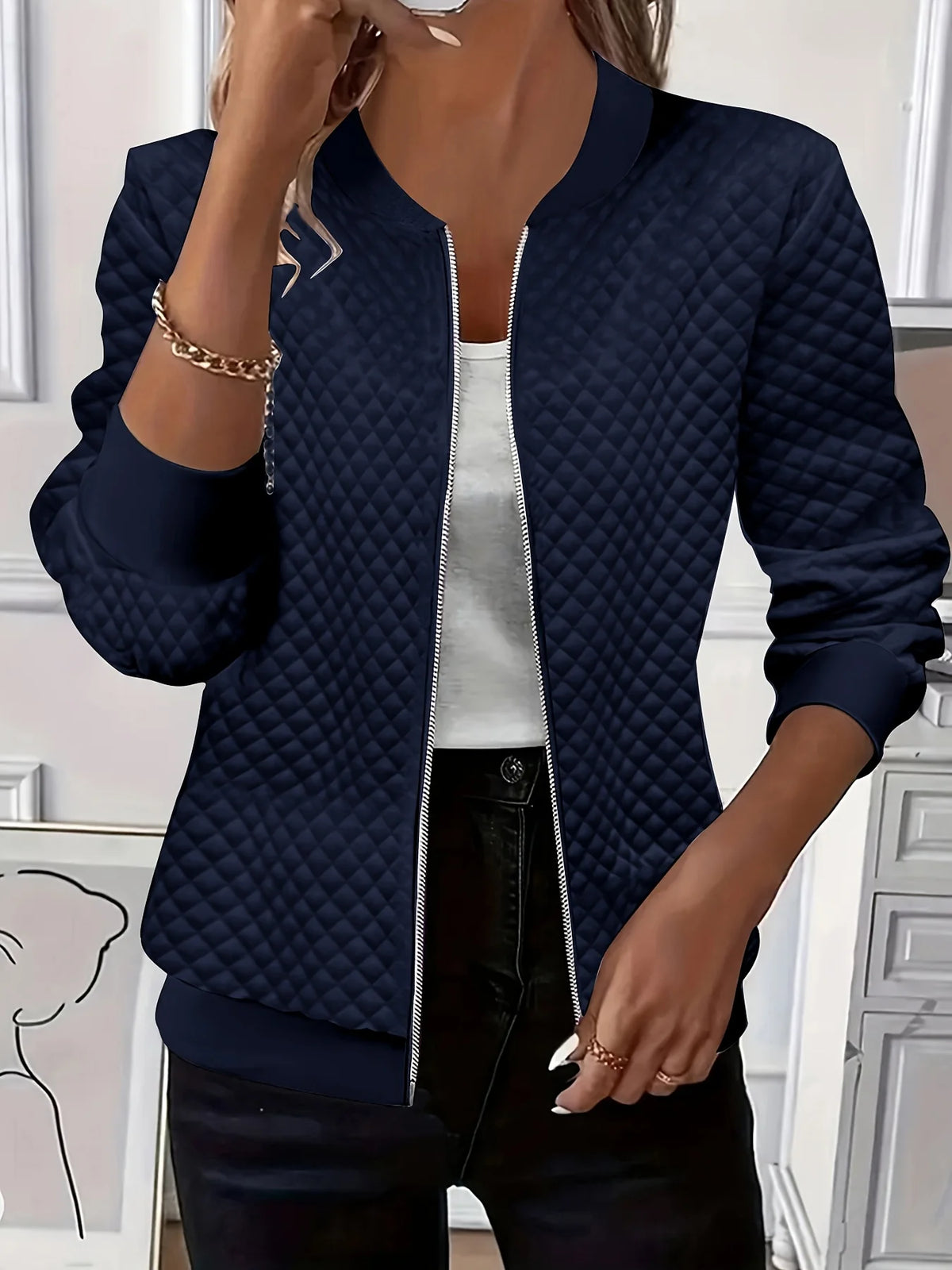 Women's blue textured quilted jacket for chilly autumn and winter days